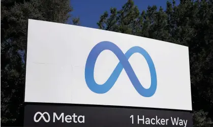  ?? Photograph: Tony Avelar/AP ?? Facebook's Meta logo sign is seen at the company headquarte­rs in Menlo Park, California.