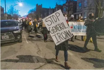  ?? TYLER PASCIAK LARIVIERE/SUN-TIMES FILES ?? The proposed relocation of the General Iron scrap-metal business to the Southeast Side prompted numerous community protests over the past four years.