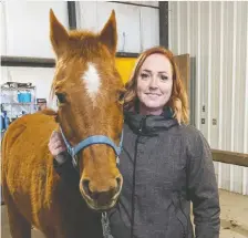  ??  ?? Jessica van der Hoek, a 20-year paramedic who battled PTSD issues, operates Prairie Sky Equine Assisted Therapy.