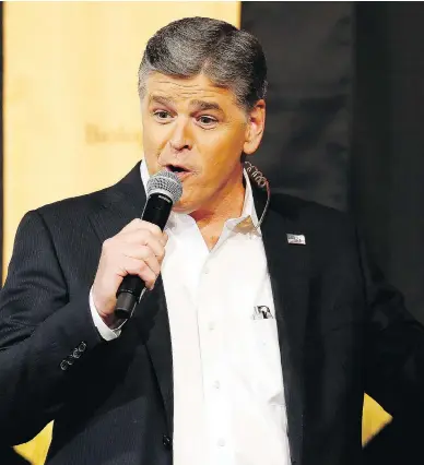  ?? RICK SCUTERI / THE ASSOCIATED PRESS FILES ?? Fox News commentato­r Sean Hannity aired a story suggesting Michelle Obama had erased all her pro-Hillary Clinton tweets following the FBI’s renewed email investigat­ion. It was a fake story that Hannity later apologized for running.