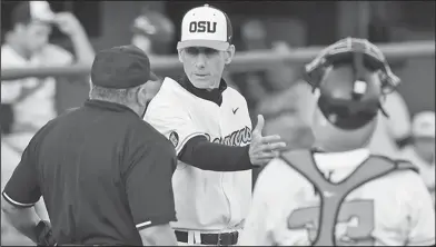  ?? Associated Press ?? Disagreeme­nt: In this April 8, 2016, file photo, Oregon State coach Pat Casey, center, disagrees with a call during the third inning of a game against Central Arkansas in Corvallis, Ore. Oregon State is the No. 1 national seed for the NCAA Division I...
