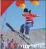  ??  ?? A young athlete takes part in a ski competitio­n at the Beidahu Ski Resort in Jilin province.