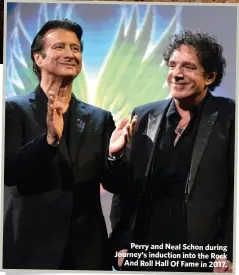  ??  ?? Perry and Neal Schon during Journey’s induction into the RockAnd Roll Hall Of Fame in 2017.