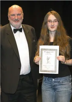  ??  ?? Merit award recipient Hannah Stephens from Kilmac Drama with the festival director.