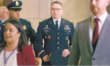  ?? ALEX WONG/GETTY ?? Army Lt. Colonel Alexander Vindman, director for European affairs at the National Security Council, arrives at a closed session before the House Intelligen­ce, Foreign Affairs and Oversight committees on Tuesday.