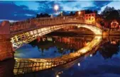  ?? PROVIDED TO CHINA DAILY ?? The Ha’penny Bridge in Dublin, Ireland, is one of the city’s main attraction­s. The first direct flight linking the Chinese mainland and Ireland is scheduled to start operating on June 12.