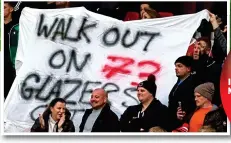  ?? PA ?? Manchester disunited: banner urges fans to protest