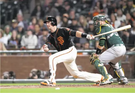  ?? Michael Macor / The Chronicle ?? As usual, Giants catcher Buster Posey is leading by example with his typically solid offense and stellar defense.