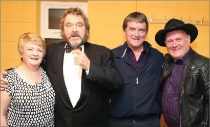  ??  ?? Mary and Ritchie Cullinane, Dromagh and Denis Withers, Banteer, chatting to Brendan Grace after his show at the Glen Theatre in October, 2018. Photos: Sheila Fitzgerald.