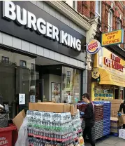  ??  ?? Burger King is among chains reopening sites