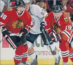  ?? | TOM CRUZE~SUN-TIMES ?? If the labor dispute continues, Hawks forwards Patrick Kane (left) and Jonathan Toews would consider playing in Europe.