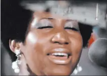  ?? Neon ?? Aretha Franklin in the long-lost concert film “Amazing Grace.”