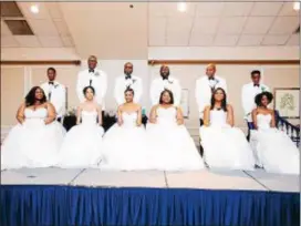  ??  ?? UPLIFT participan­ts are joined by positive male role model escorts. In front are: Skye Thomas, Ava President, Sanaa Nixon, Sade Davis, Camryn Jones and Tayana Harris. In back: Shane Thomas, brother; Broderick President, father; Donald Green, father;...