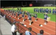  ?? EVAN BRANDT — DIGITAL FIRST MEDIA ?? Smiles brightened the faces of the Pottstown High School cheerleade­rs as they raised spirits at the first Friday night football game under the lights in three years.