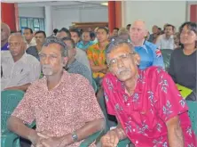 ?? Picture: REINAL CHAND ?? Left: Sugarcane farmers Vijay Kumar (left) and Parmendra Singh attend a sugar consultati­on at the Sugar Cane Growers Council Hall in Lautoka.