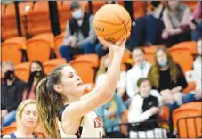  ?? Westside Eagle Observer/MIKE ECKELS ?? Dalacie Wishon (1) puts up a free throw late in the fourth quarter of the Gravette-Harrison conference contest at Lion Arena in Gravette. Wishon hit the free throw for one of her eight points for the night.