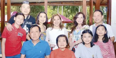  ??  ?? (Seated, from left) Henry and Mary Licup with Cassie and Caitlin Lim; (standing, from left) Cullen, Michael and Cathy Lim, Ross, Roselie and Peter Licup.