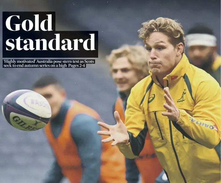  ??  ?? Australia captain Michael Hooper gets a feel of the ball during training at BT Murrayfiel­d ahead of today’s autumn internatio­nal against a Scotland side who came close to matching New Zealand last week.