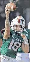  ?? DAVID SANTIAGO/AP ?? UM’s Tate Martell, still in the hunt to start the season opener, runs drills recently at practice.