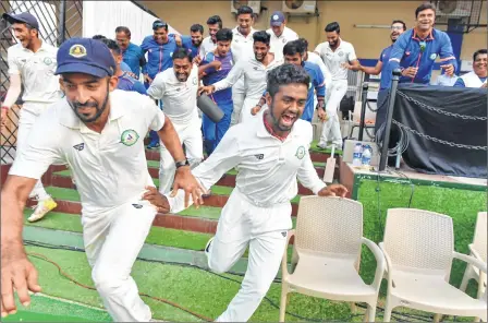  ??  ?? VICTORY RUN : Vidarbha players jubilant after winning the Ranji Trophy final against Delhi by 9 wickets, in Indore on Monday.