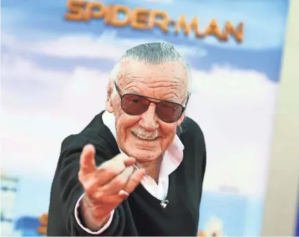  ?? JORDAN STRAUSS/INVISION/AP ?? Stan Lee, at the premiere of “Spider-Man: Homecoming,” created the persona that he became known for, according to a new biography, “The Rise and Fall of Stan Lee.”