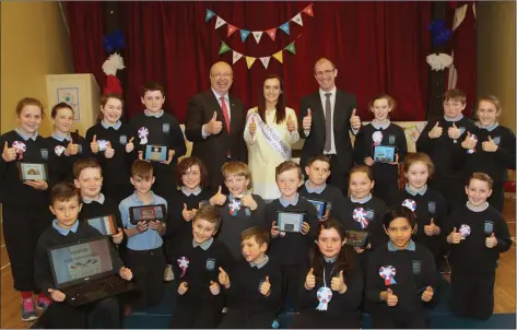  ??  ?? French Ambassador Jean Pierre Thebault visited Boolavogue NS to view the school’s Blue Star programme on France. He is pictured with 5th and 6th class pupils, teacher and newly-crowned Wexford Rose Julie Sinnott and school principal Seamus Dempsey.