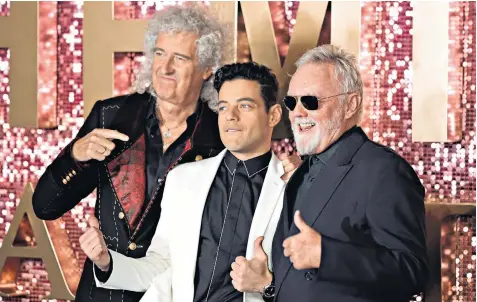  ??  ?? Queen stars Brian May and Roger Taylor join actor Rami Malek, who plays Freddie, at the world premiere of the film Bohemian Rhapsody at the SSE Arena, Wembley, last night