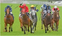  ?? AFP file ?? Redzel, ridden by jockey Kerrin McEvoy (second left) wins the Everest 2017 horse race, the world richest turf race at Royal Randwick race course in Sydney. —