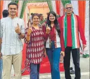  ?? HT ?? Former state chief secretary RK Tiwari and his family members after exercising their franchise at community centre, Sector 105, Noida on Friday.