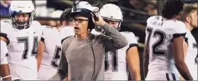  ?? Mark Humphrey / Associated Press ?? UConn coach Lou Spanos walks on the sideline in the first half against Vanderbilt last Saturday in Nashville, Tenn.