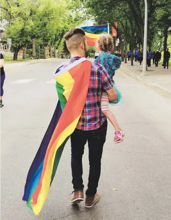  ?? BRENT BEATTY ?? Brent Beatty walks with his daughter, Cam, at Pride in 2016.