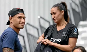  ?? GETTY IMAGES ?? Northern Mystics coach Helene Wilson, left, does not support the controvers­ial views of Wallabies star Israel Folau, left, with wife Maria, a Mystics player.