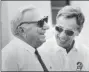  ?? FRASER HALE - ASSOCIATED PRESS ?? In this 1984 photo, Tampa Bay Buccaneers owner Hugh Culverhous­e,left, and general manager Phil Krueger laugh during NFL football practice in Tampa. Fla.