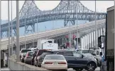  ?? ALAN DEP/MARIN INDEPENDEN­T JOURNAL ?? Motorists begin to turn around Thursday on the eastbound lanes of the Richmond-San Rafael Bridge because of an emergency inspection.