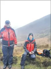  ?? Roche) (Pic: Marian ?? Gerry Tobin, Louise Burgoyne and Lyla, overseeing the pre-assessment training weekend with SARDA in the Knockmeald­owns early in February when TheAvondhu caught up with them.