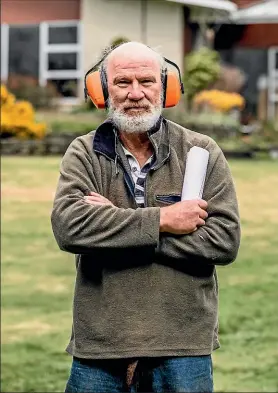  ?? ?? Bryan Phillips says noise from the New Plymouth Pistol Club means he has to wear earmuffs when gardening.