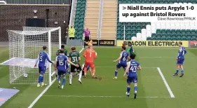  ?? Dave Rowntree/PPAUK ?? > Niall Ennis puts Argyle 1-0 up against Bristol Rovers