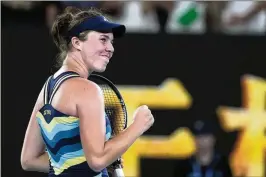  ?? ANDY WONG/AP ?? Linda Noskova celebrates after finishing off her upset of Iga Swiatek in their third-round match at the Australian Open. Noskova lost the first set but steadied herself in the second set, then finished strong in the third set for a 3-6, 6-3, 6-4 win.