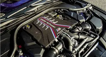  ??  ?? Above: 4.4-litre biturbo V8 from previous F10-gen M5 now makes extra 40bhp, lifting total to 592bhp; AWD traction means 0-62mph takes a mere 3.4sec