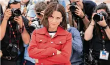  ?? ?? French actress Juliette Binoche poses during a photocall for the film “La Passion de Dodin Bouffant” (The Pot-au-Feu) at the 76th edition of the Cannes Film Festival, on May 25.