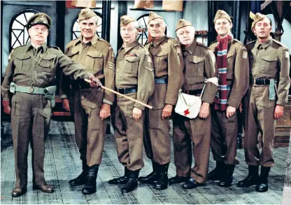  ??  ?? Last line of defence: the Dad’s Army cast, above; Charles Moore’s uncle Norman, right; and a member of the Dorking Home Guard in 1940