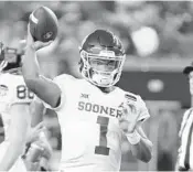  ?? LYNNE SLADKY/AP FILE ?? Oklahoma quarterbac­k Kyler Murray warms up before the Orange Bowl. He plans to play in the NFL rather than MLB.