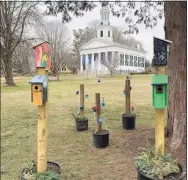  ?? Sarah Page Kyrcz / For Hearst Connecticu­t Media ?? A garden of Heart Houses on the front lawn of the First Congregati­onal Church in Madison.