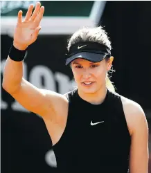  ?? PETR DAVID JOSEK/THE ASSOCIATED PRESS ?? Eugenie Bouchard came back to win her first-round match at the French Open against Japan’s Risa Ozaki, 2-6, 6-3, 6-2, on Tuesday.