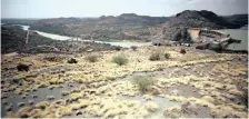  ?? | MIKE HUTCHINGS Reuters African News Agency (ANA) ?? WATERWAYS on farmland on the banks of the Orange River.