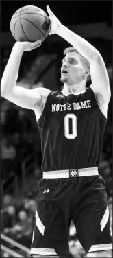  ?? MICHAEL CATERINA/AP FILE ?? Notre Dame's Rex Pflueger (0) shoots against Chicago State during an NCAA college basketball game Nov. 8, in South Bend, Ind.