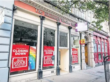  ??  ?? STRUGGLING: Edinburgh Woollen Mill stores could soon close. Picture by Steve Brown.