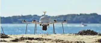  ??  ?? PLANNING FOR THE WORST: Bay State authoritie­s, including FBI agent Harold Shaw, are planning to use new drone technology, above, from Danvers-based CyPhy Works to thwart any possible attacks during this year’s Boston Marathon.