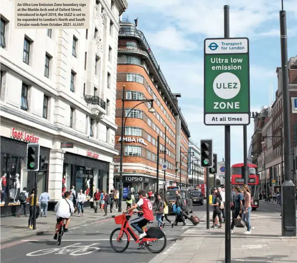  ?? ALAMY. ?? An Ultra Low Emission Zone boundary sign at the Marble Arch end of Oxford Street. Introduced in April 2019, the ULEZ is set to be expanded to London’s North and South Circular roads from October 2021.