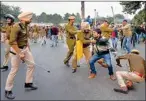  ?? PTI ?? JNU students engaged in a scuffle with the police